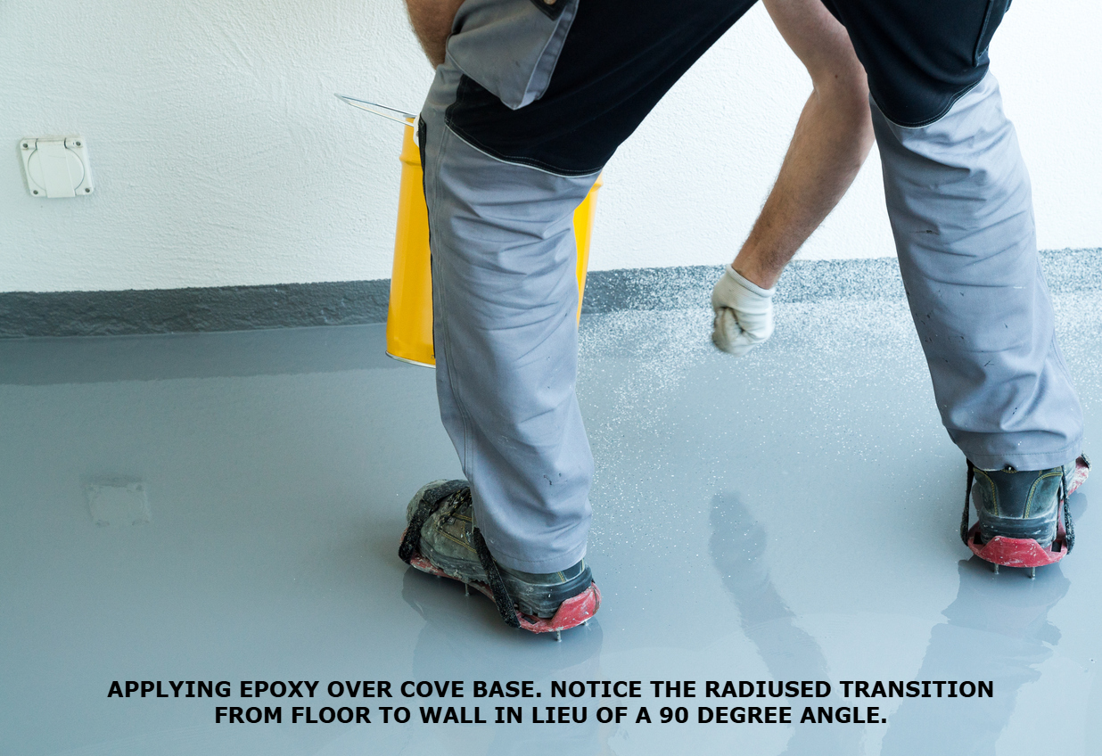 Commercial Kitchen Epoxy Being Apllied To Epoxy Cove Base