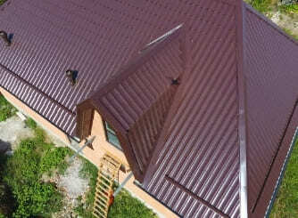 Aerial View of Metal Roof Coating on Commercial Building