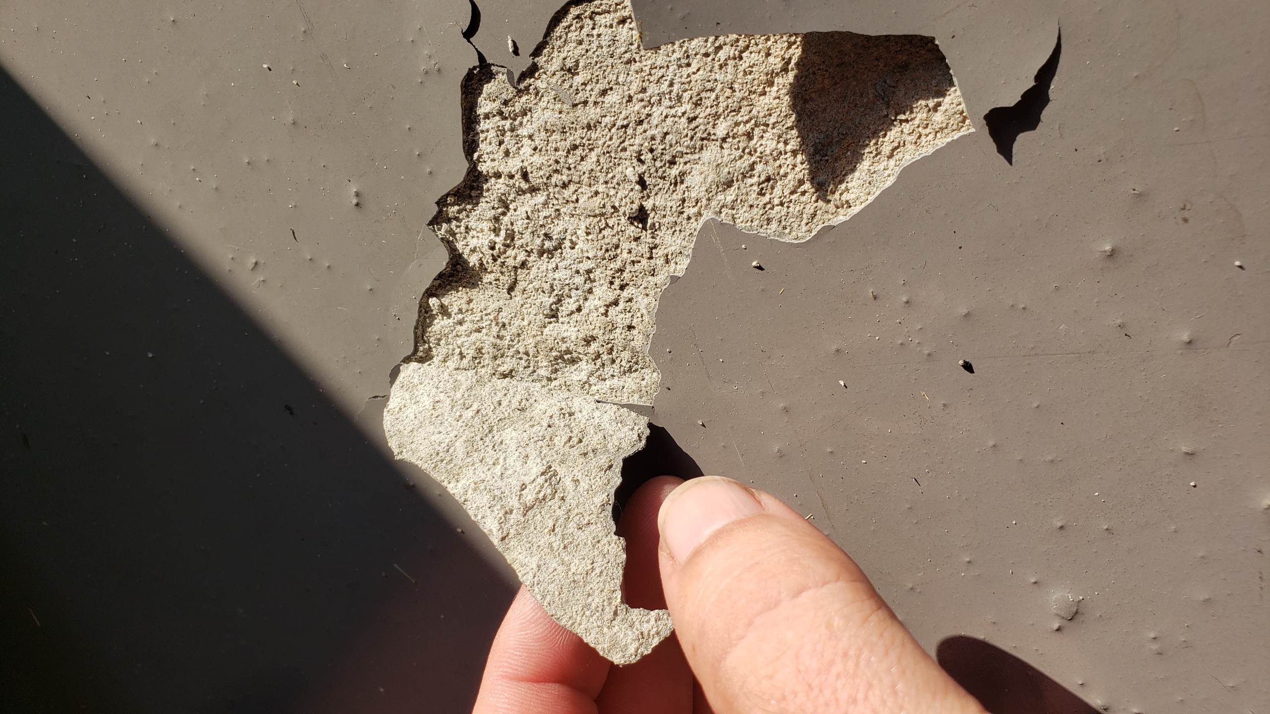 EPOXY COATING PEELING OFF POOR QUALITY CONCRETE