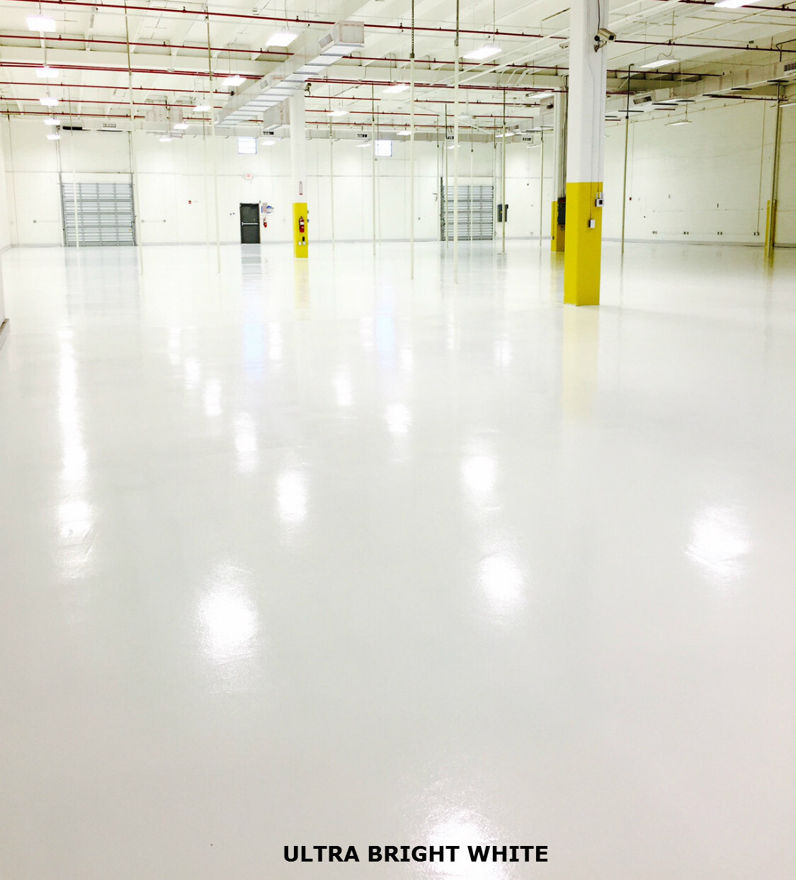 Bright white industrial epoxy floor in warehouse