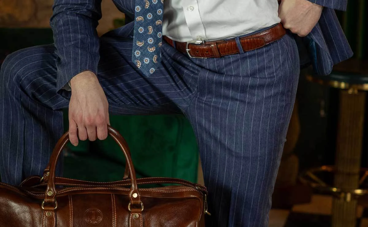 Torino Leather Belts in a suitcase.