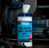 CP150 - A canister of Vinco-TuffScrub Industrial Tool & Hand Wipes situated on a mechanics worktop