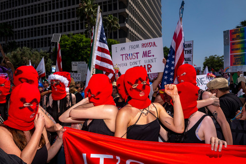 Protesters gathered in public space emphasizing political expression and collective action