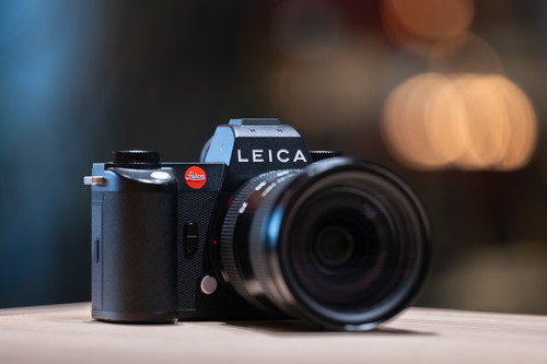 Leica SL3 camera photographed on a tabletop  in ambient lighting