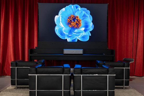 Home cinema setup featuring a large screen display for photo review