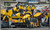Yellow race crew servicing their car in the pit lane