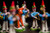 Colorful miniature figures arranged closely to demonstrate shallow depth of field and focus control