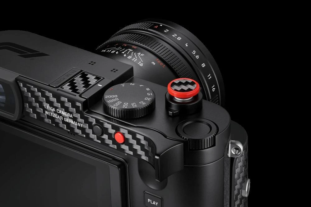 Engraved top plate, lens cap and special-edition details of the Leica Q3 43 Formula 1® Edition