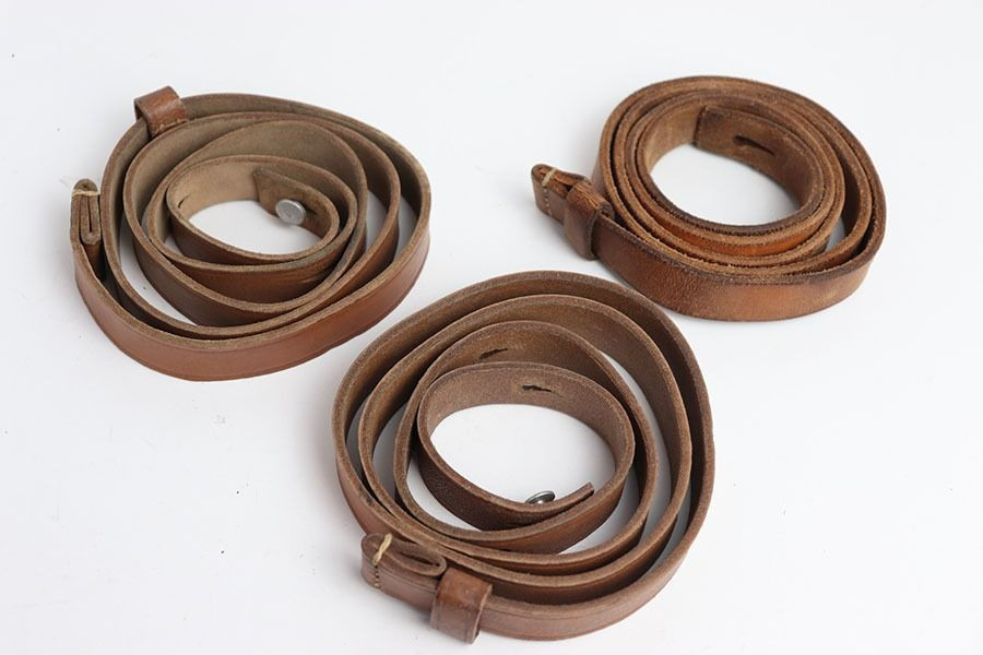 Three Unmarked Leather Slings - 1