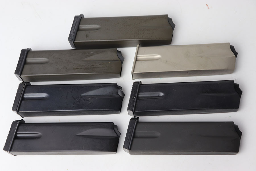 Seven Post-War Browning Hi-Power Magazines - photo 1 of 8