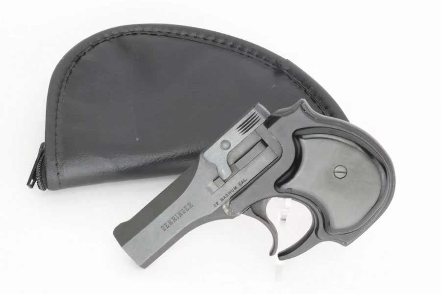 High Standard .22 Magnum derringer - with pouch
