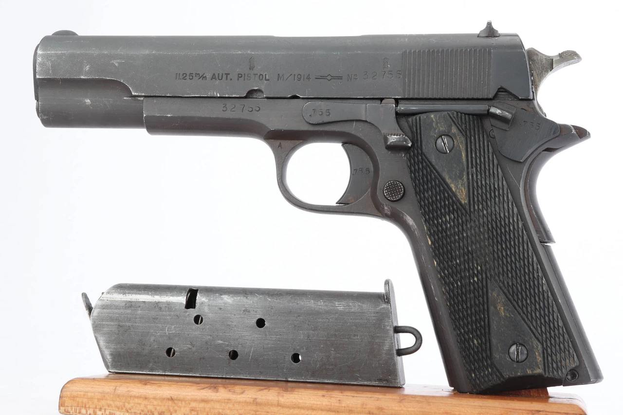 1947 Kongsberg M1914 pistol - left side with magazine