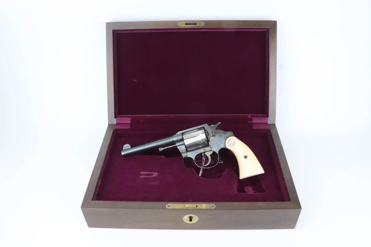 Silver engraved Colt Police Positive .38 revolver, Oscar G. Olander - in presentation case