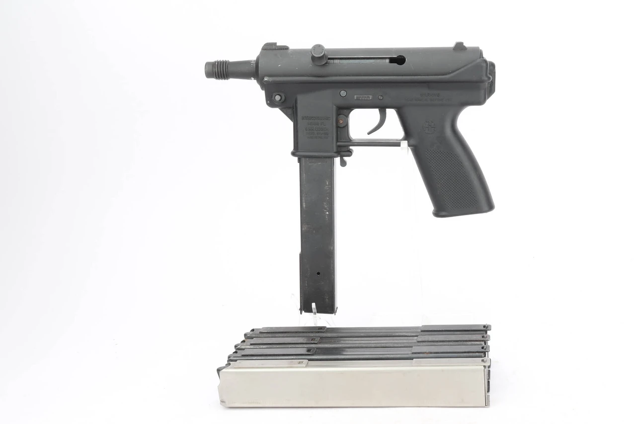 Pre-ban Interdynamic KG-99 pistol with extra magazines - left side with magazine