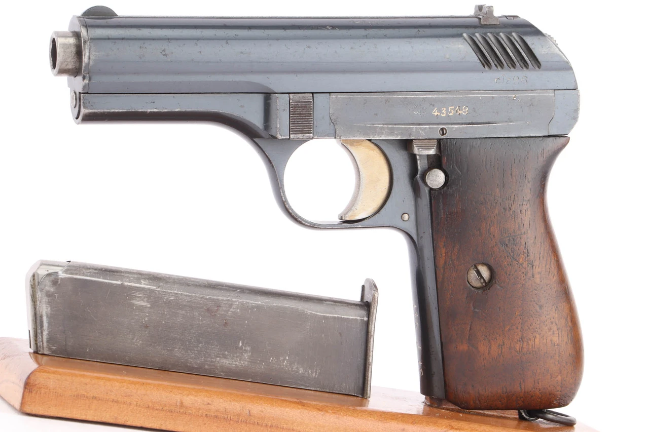 1926 unit marked CZ 24 pistol - left side with magazine