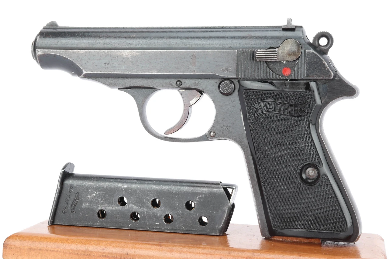 End-of-war Waffen Walther PP pistol - left side with magazine