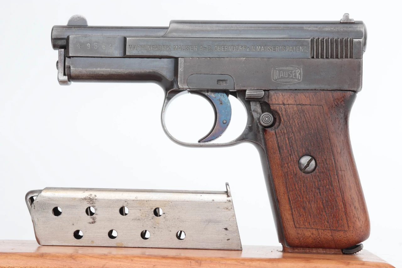 Early side latch Mauser Model 1910 pistol - left side with magazine