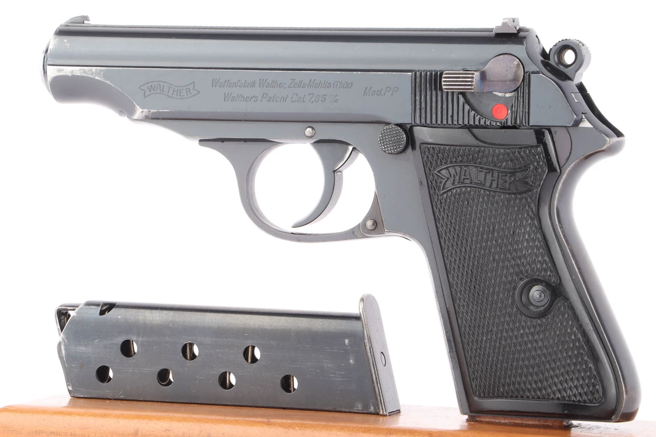 5 digit serial Walther PP pistol - left side with magazine