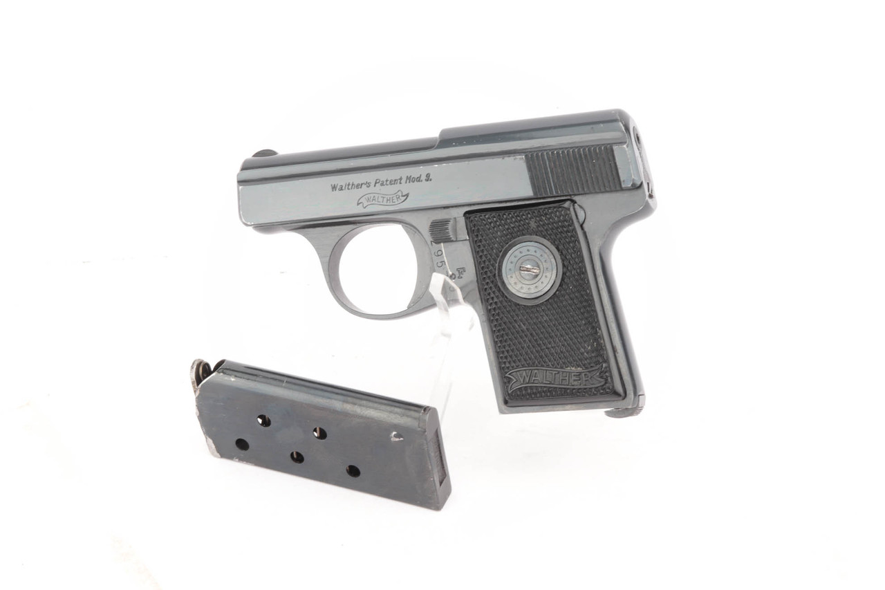 Walther Model 9 Type II pistol - left side with magazine