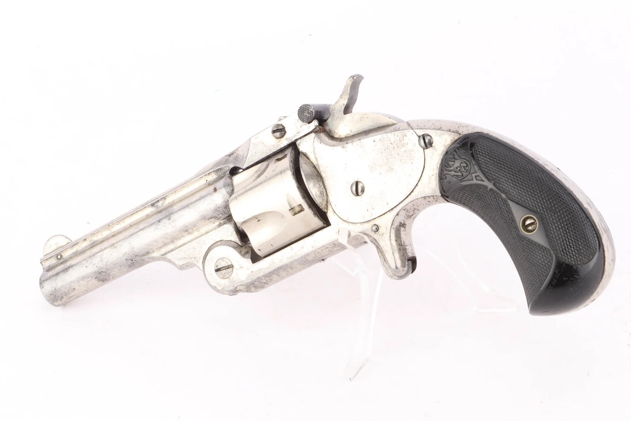 Nickel Smith & Wesson .32 top break revolver - right side