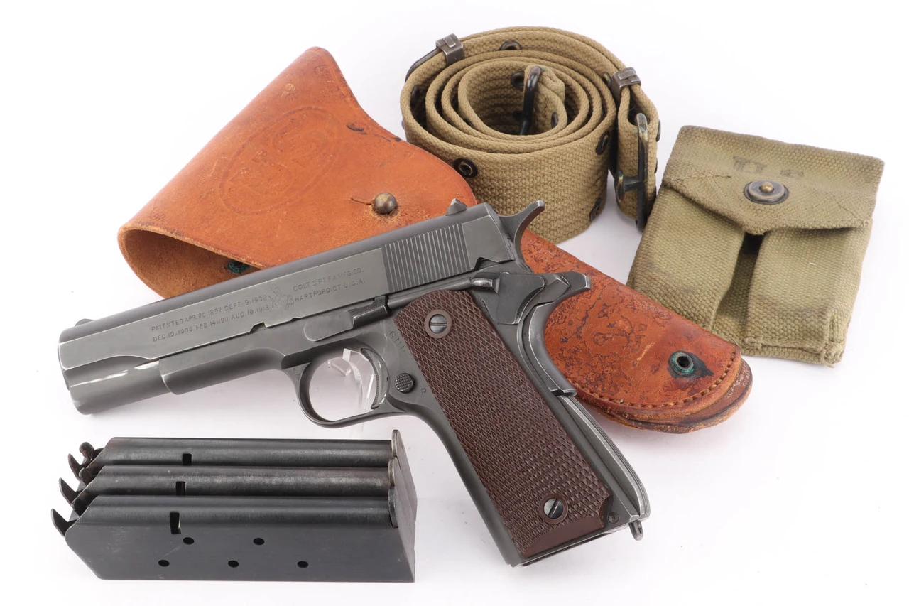 Excellent 1944 Colt Model 1911A1 Rig - photo 1 of 24