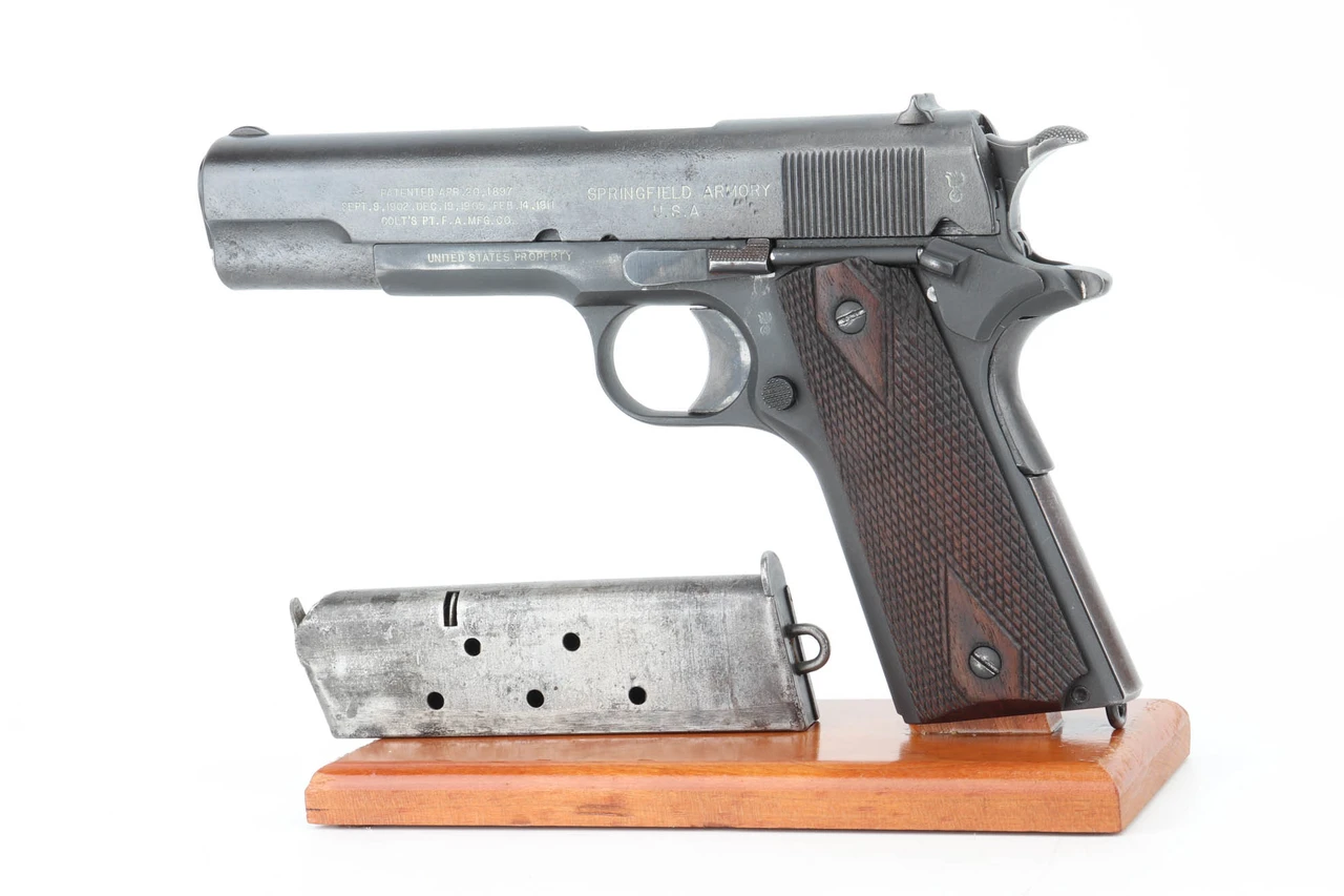 1915 Springfield Armory M1911 pistol - left side with magazine