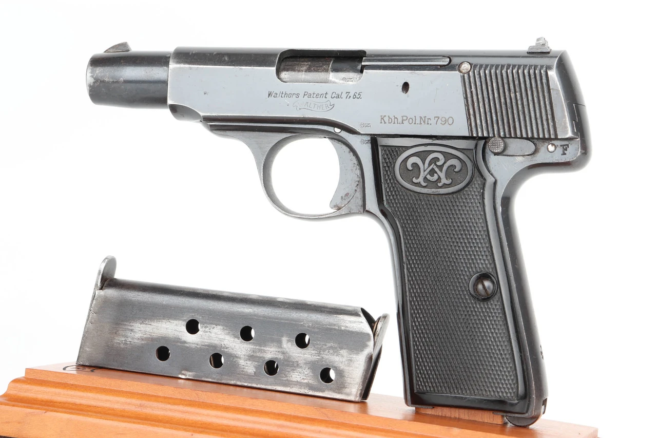 Walther Model 4 Copenhagen Police pistol - left side with magazine on display stand