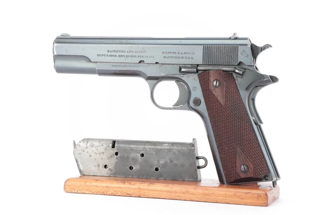 1913 Early Colt M1911 - left side with magazine