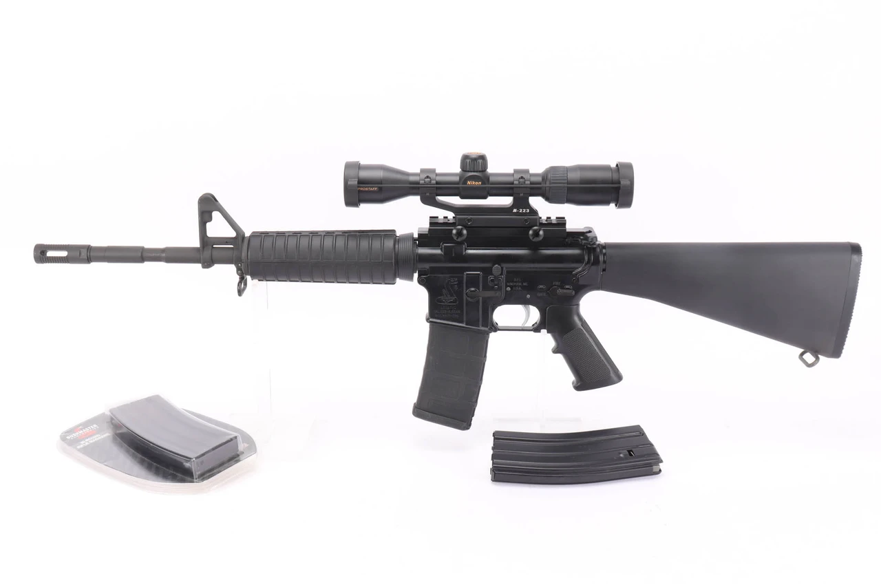 Bushmaster XM15-E2S w/ Nikon Scope - photo 1 of 21