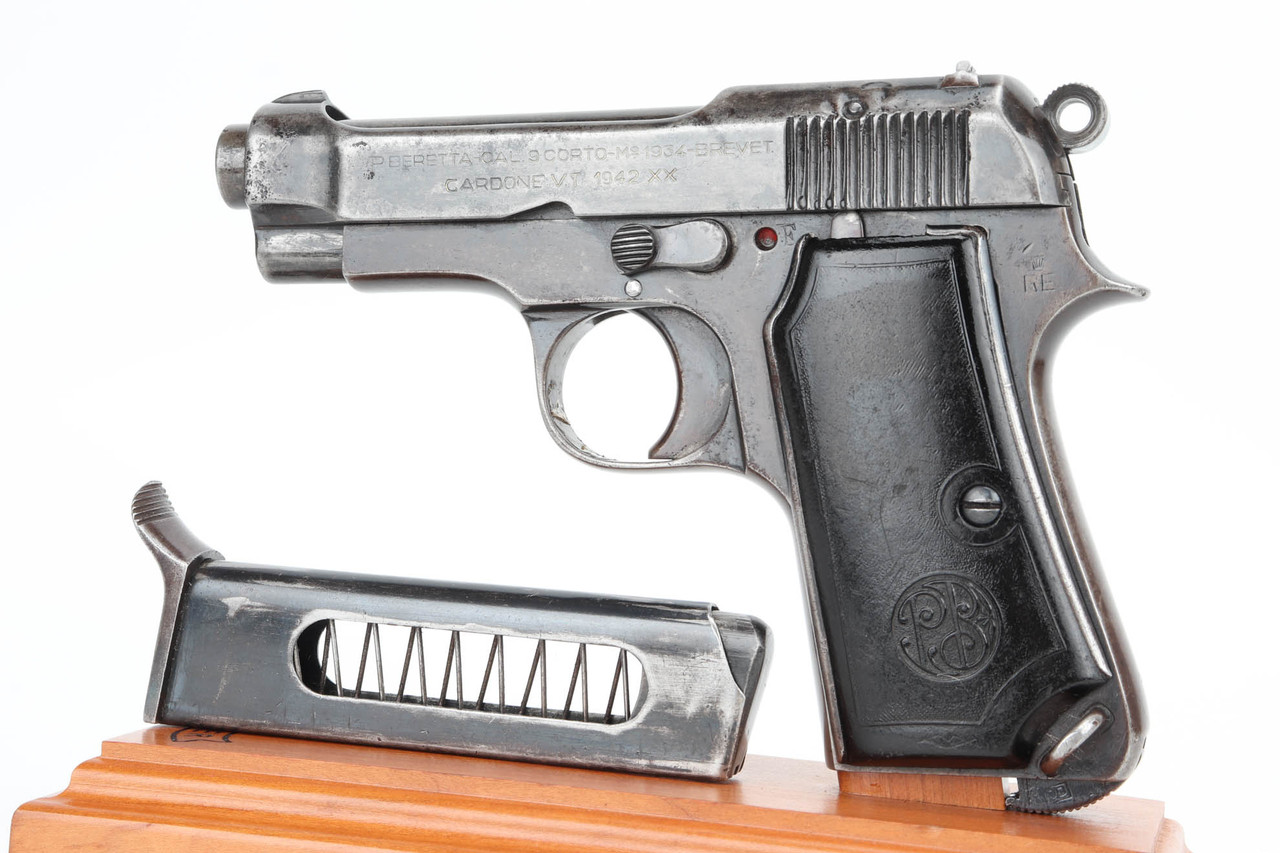 1942 Italian Beretta Model 1934 9mm Corto pistol - left side view with magazine