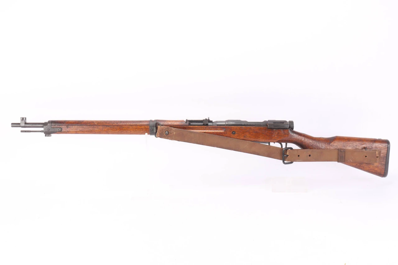 Kokura Type 99 Arisaka 24th Series 7.7x58 rifle - left side full view with sling
