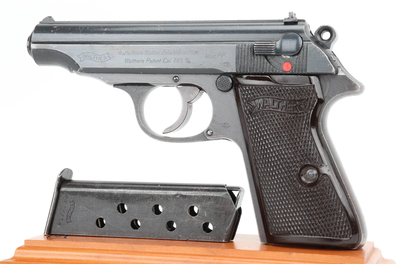 1944 Waffen Walther PP 7.65mm - left side view with dark brown grips and wartime magazine