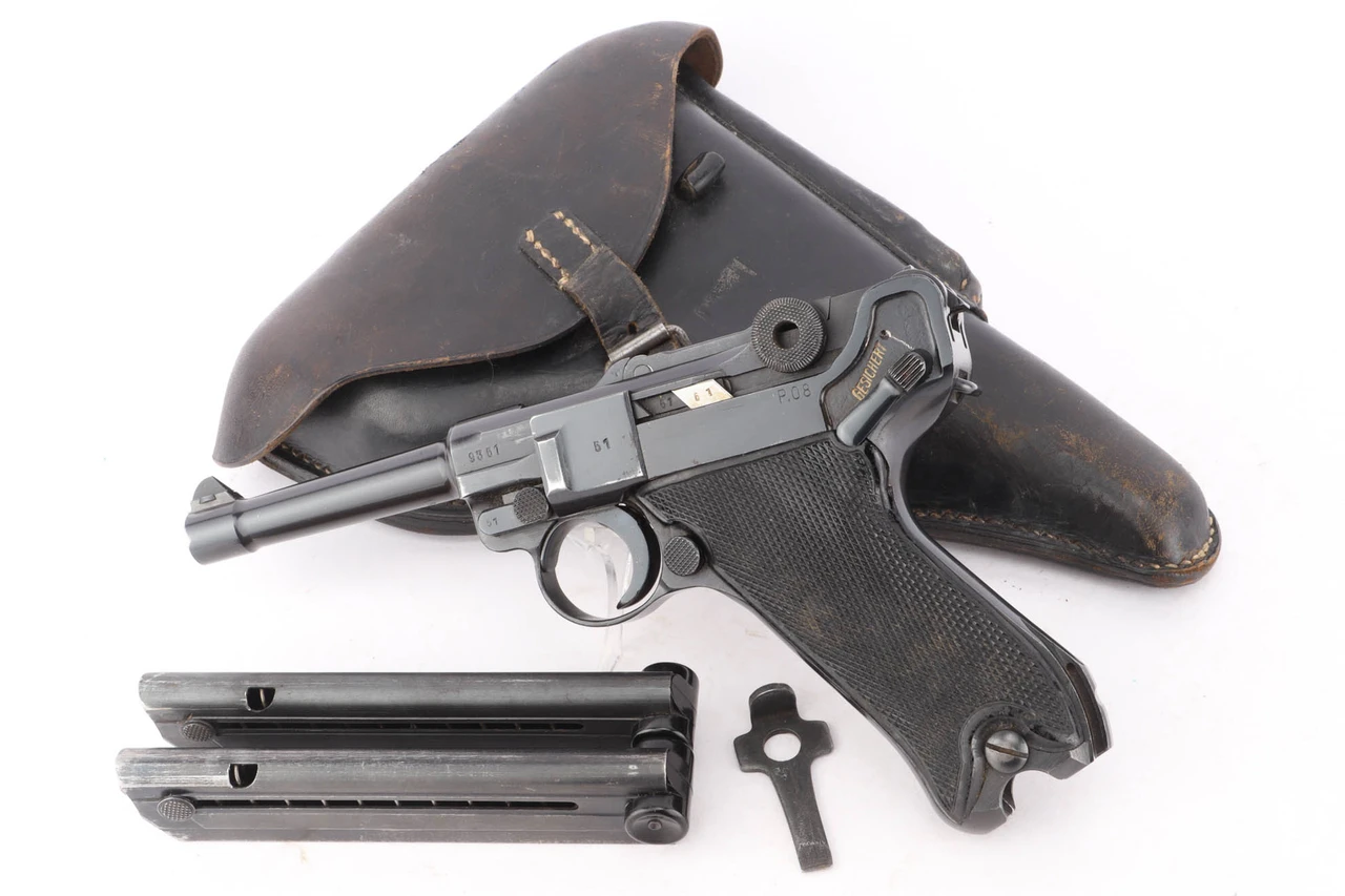 1942 BYF 42 Black Widow Mauser Luger Rig - shown with holster, two magazines and tool