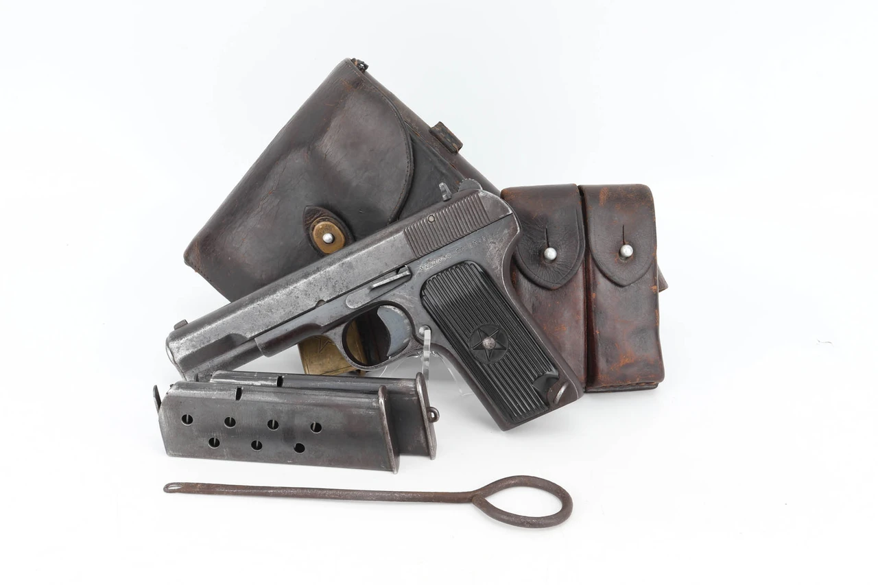 1956 Chicom Tokarev Type 54 7.62x25mm pistol - shown as a rig with holster, belt, magazine pouch, magazine and cleaning rod
