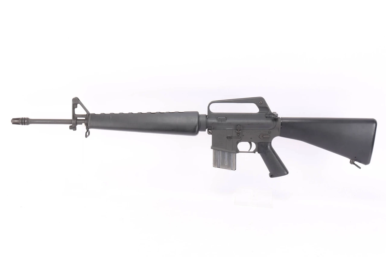 1967 Colt AR-15 SP1 .223 Remington rifle - full left side view with 20 round magazine