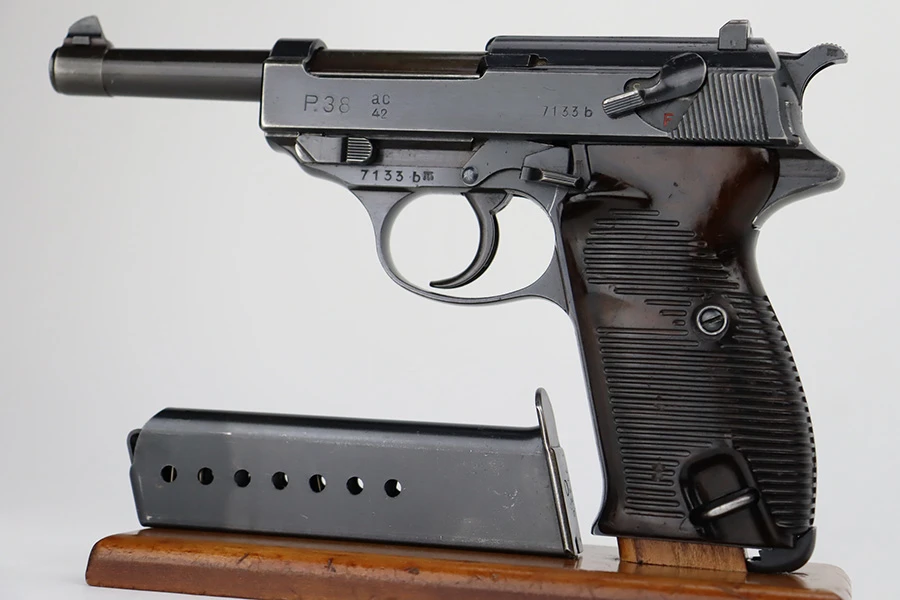 1942 ac 42 Walther P.38 9mm pistol - left side view with matching magazine