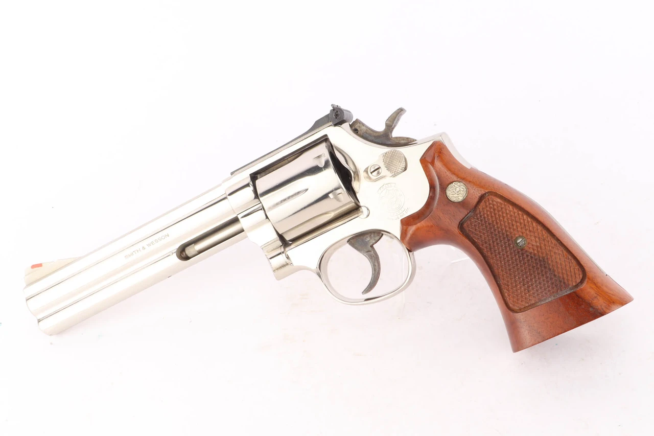 Nickel S&W Model 586 6 inch .357 Magnum revolver - left side view