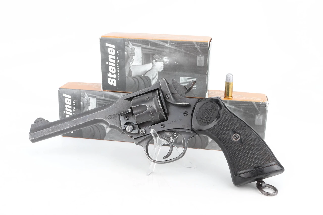 WW2 British Webley Mk IV .38 S&W revolver - shown with three boxes of Steinel 38/200 ammo