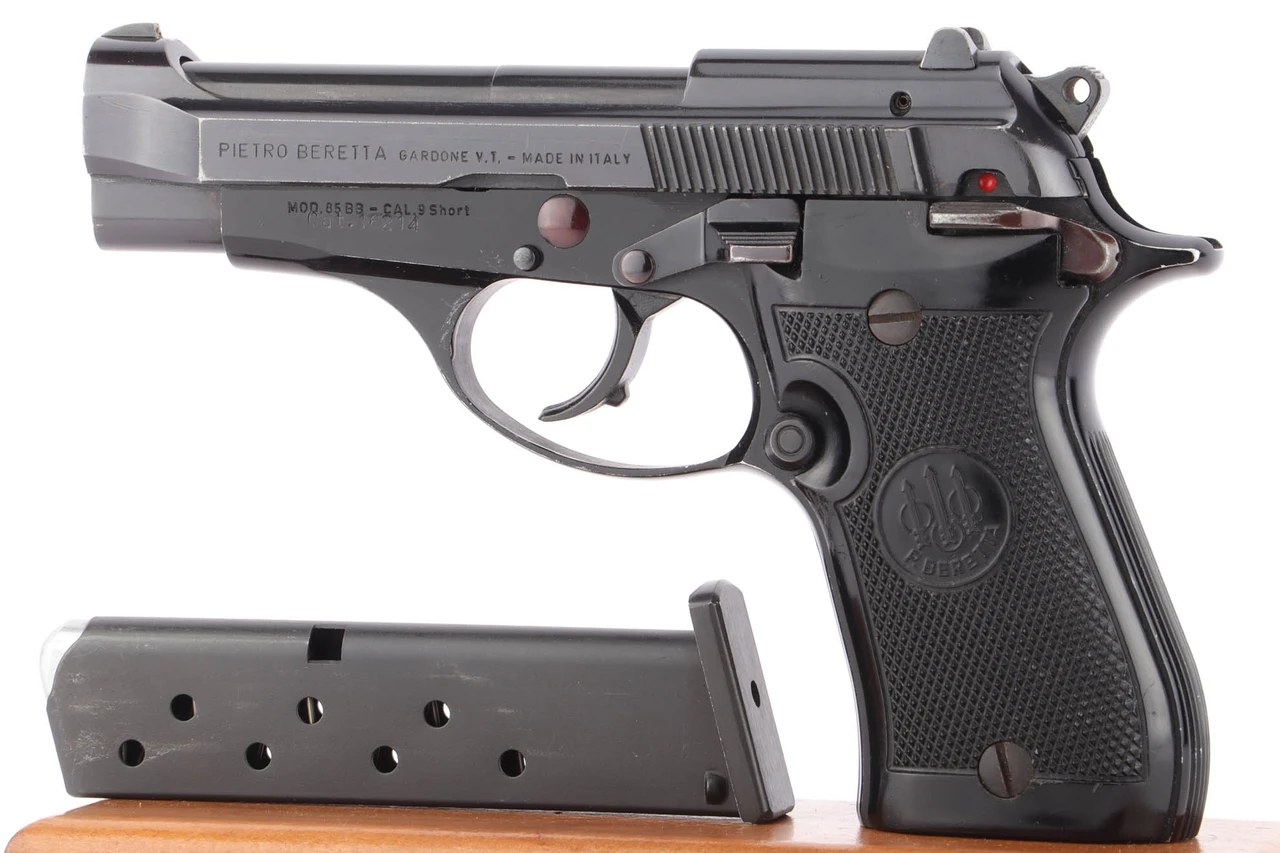 1984 Beretta Model 85BB 9mm Short .380 pistol - left side view with magazine