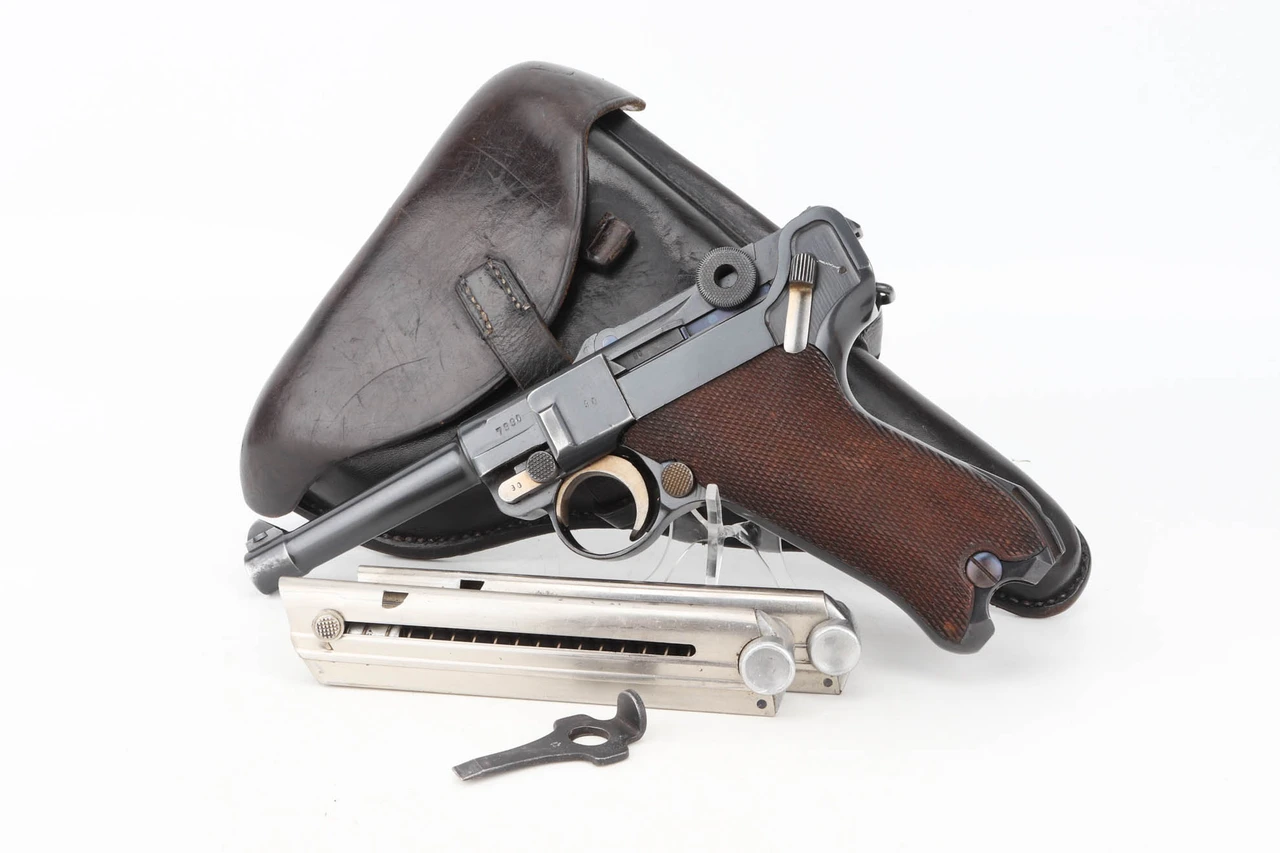 1936 Mauser S/42 Luger rig with holster, two magazines and Eagle 63 tool