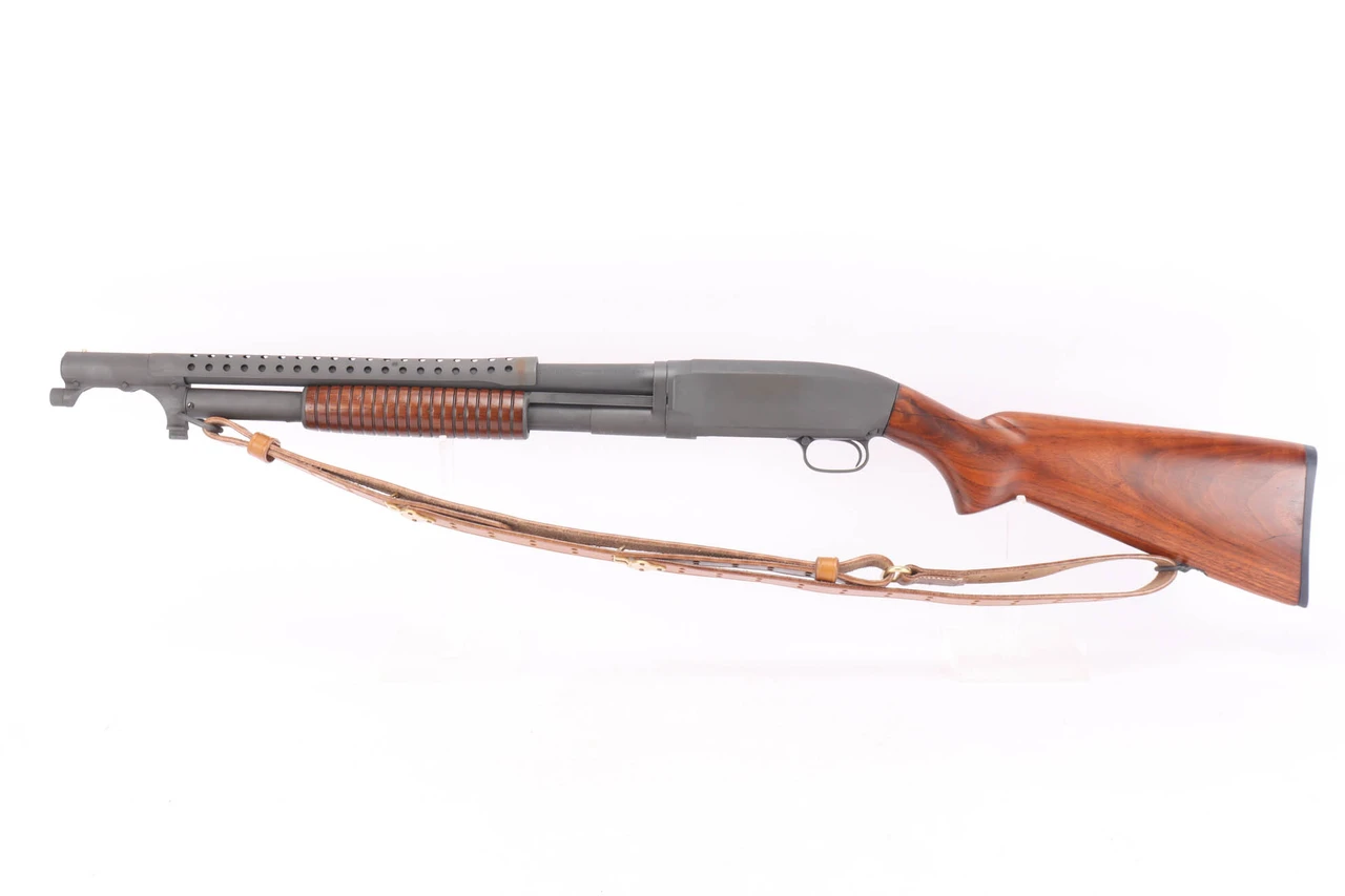 1923 Winchester Model 12 faux trench gun 12 gauge - left side view with leather sling