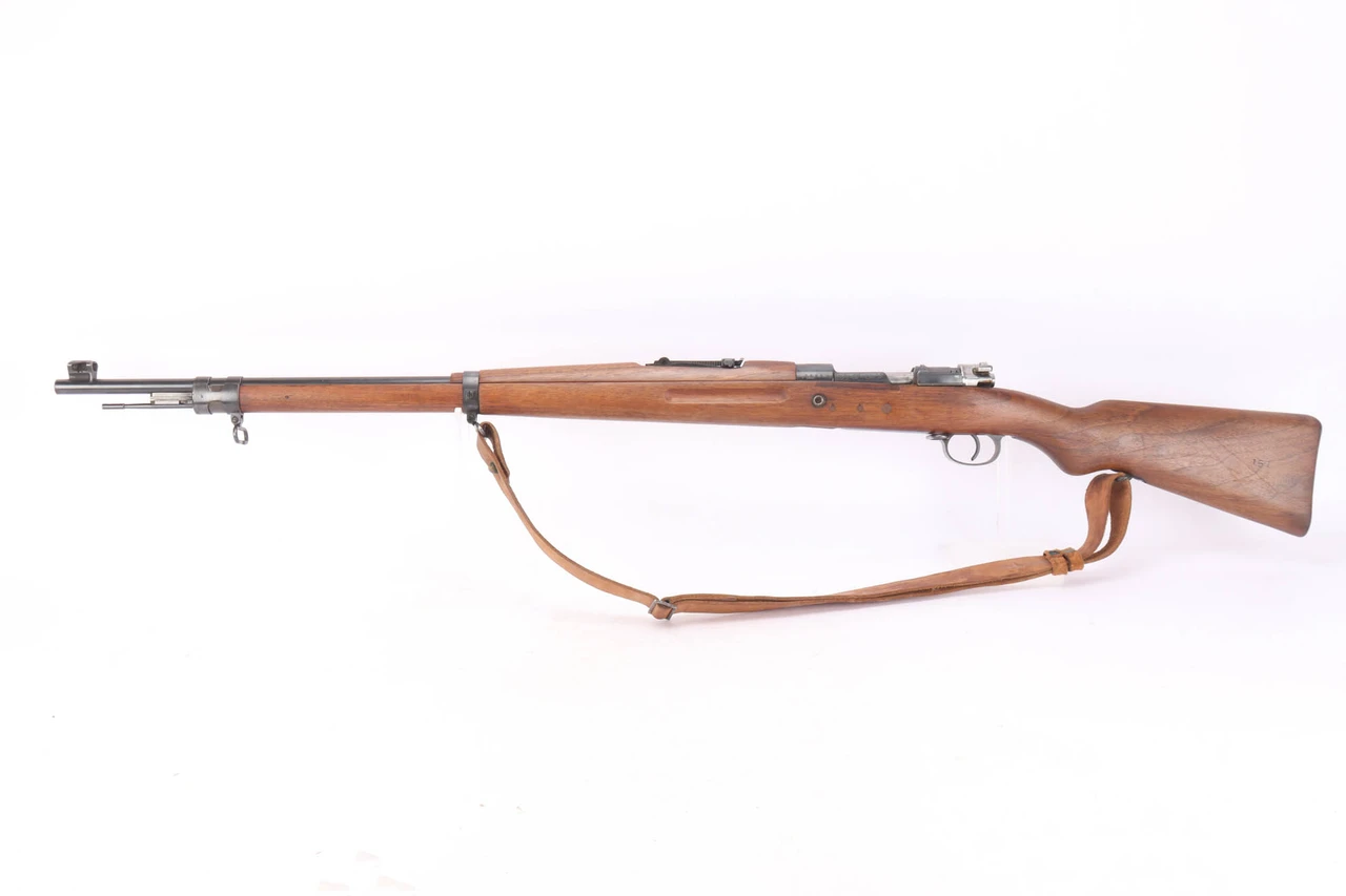 Persian Model 98/29 Mauser 8mm rifle - left side view with leather sling