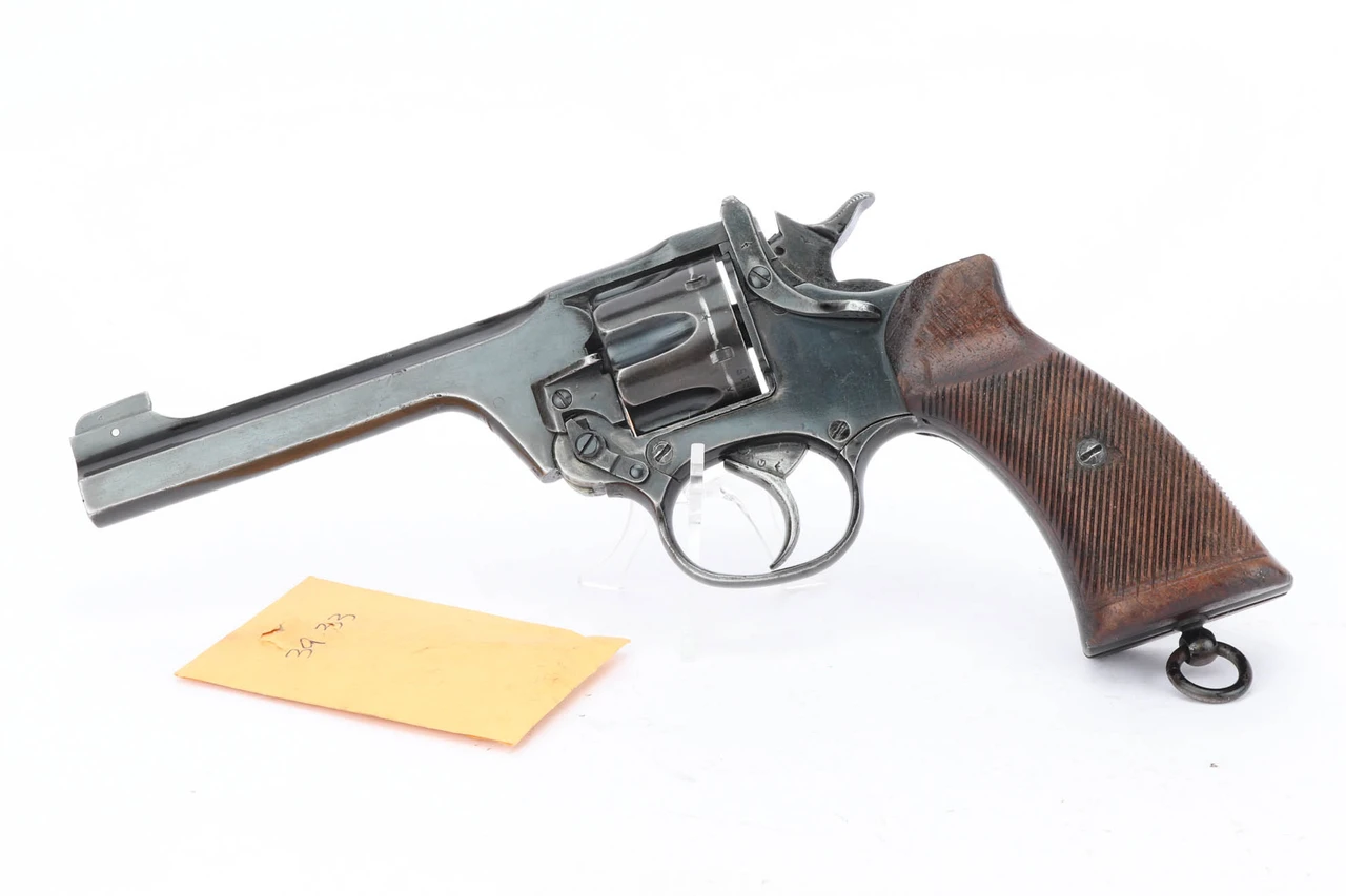 1942 British Military Webley Mk IV Revolver - .38 S&W - left side with envelope