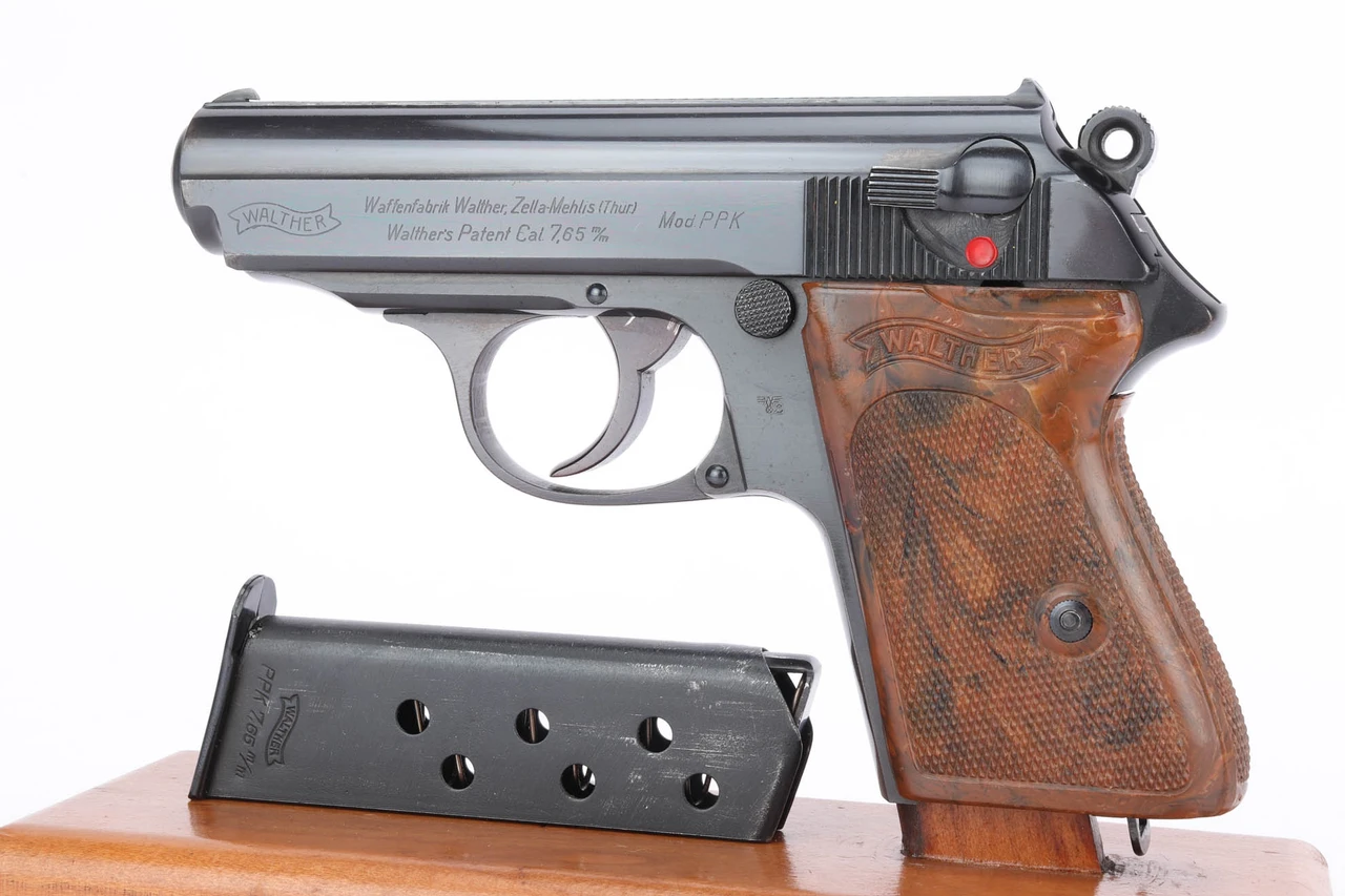 1941 high polish police Eagle/C Walther PPK 7.65mm pistol - left side view with wartime magazine