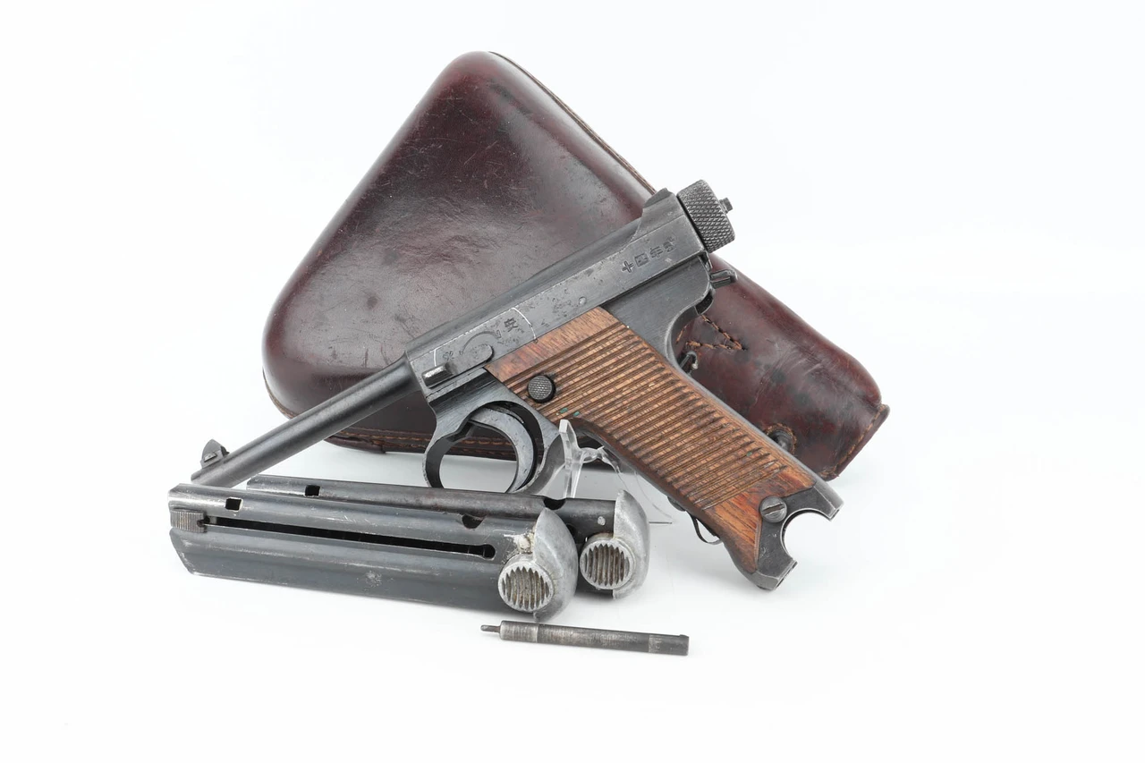 1944 Nambu Type 14 rig with two magazines and leather holster
