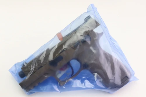 Unopened Sig Sauer M18 military overrun pistol - pistol in sealed bag