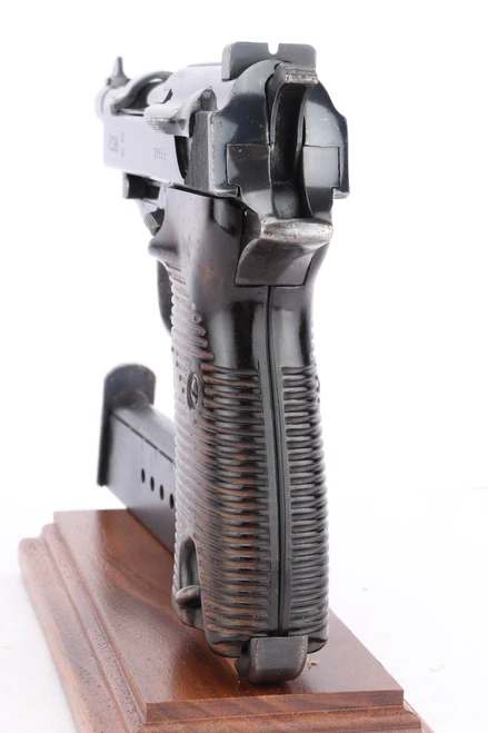 Second variation AC 41 Walther P.38 with near-matching magazine - rear view of grip