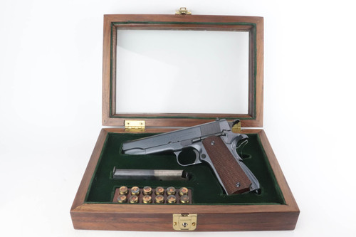 1924 transitional Colt 1911A1 in display case - in display case