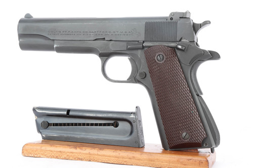 1945 Colt Service Model ACE .22 pistol - left side with magazine