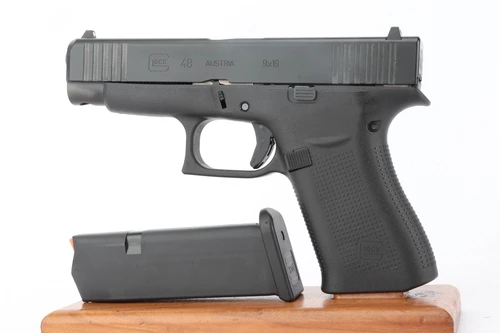 Glock 48 Gen 5 pistol - left side with magazines